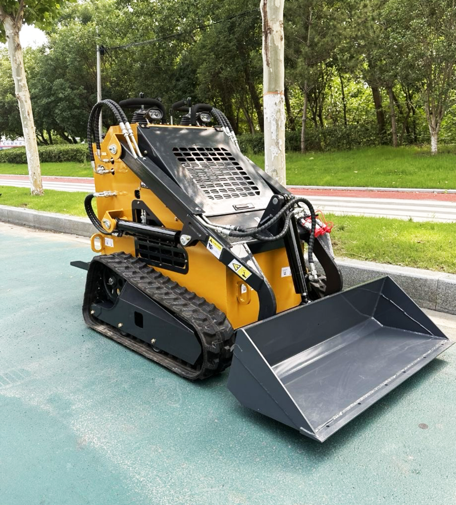 Mini chargeuse sur chenilles pour travaux de chantier et manutention